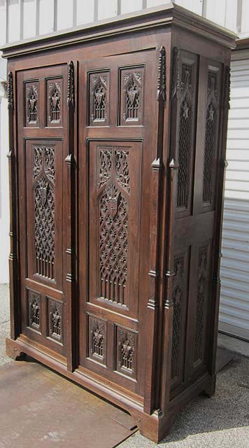 gothic armoire with heraldry