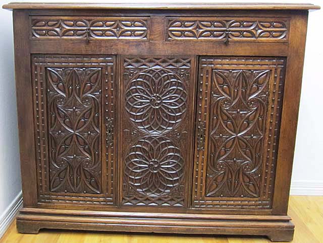 antique gothic buffet cabinet with elaborate tracery