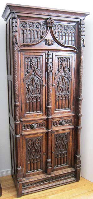 antique cabinet or armoire in gothic style from France
